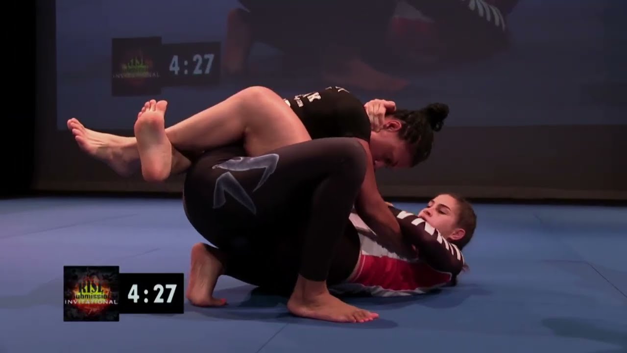 Womens Jiu Jitsu - Wild Triangle Choke Attempt background