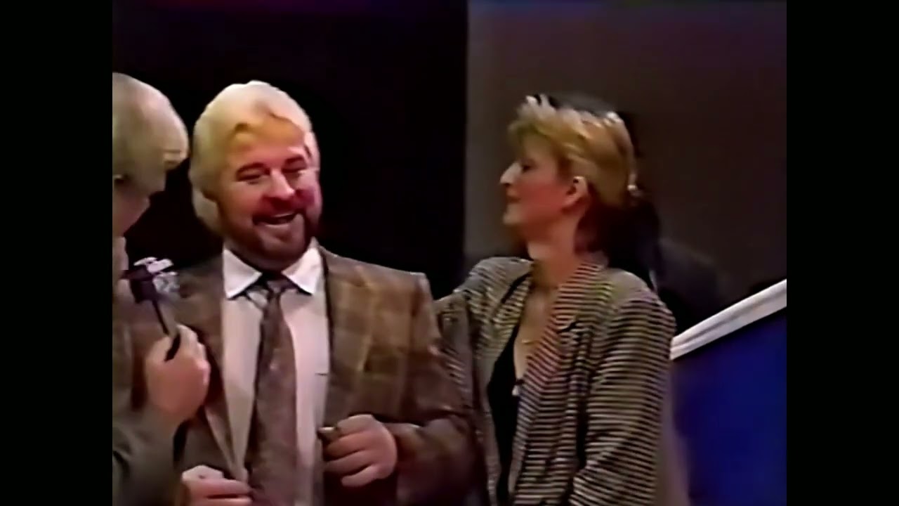 Eric Embry has a new look and new valet - USWA 12/7/91 background