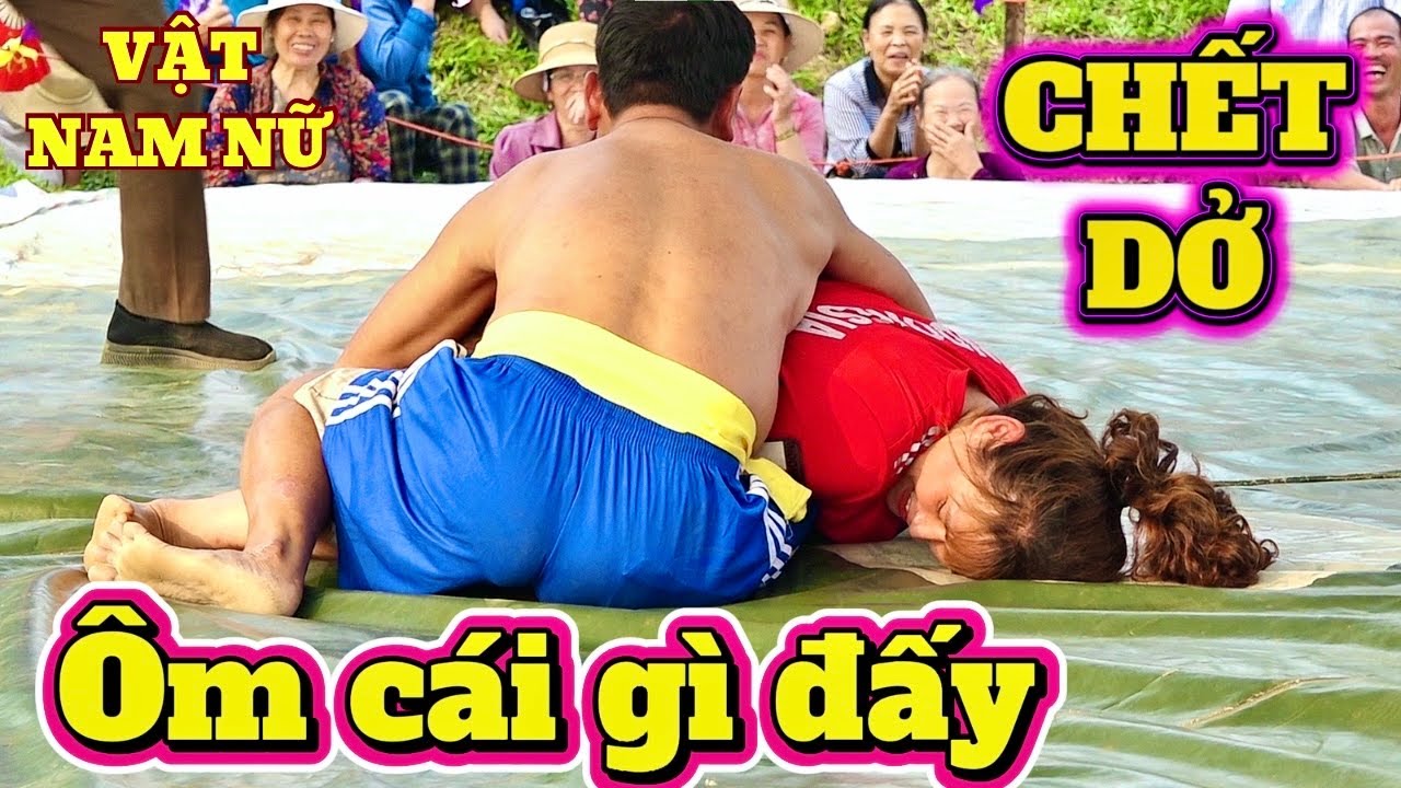 KEO VẬT NAM NỮ RẤT HIẾM GẶP ,Boy and girl wrestling. background