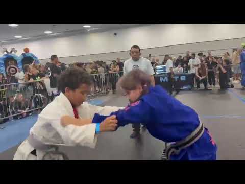This BJJ Girl has the HEART of a LION backdrop