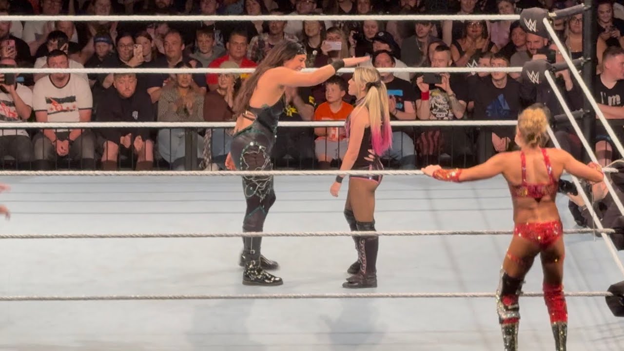 Alexa Bliss & Charlotte Flair vs Roxanne Perez & Raquel Rodriguez FULL MATCH - #WWE Live Event backdrop