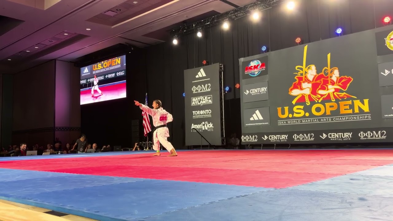 Julia Damasceno 13 & Under Girls Traditional Forms World Championship - US Open 2026 backdrop