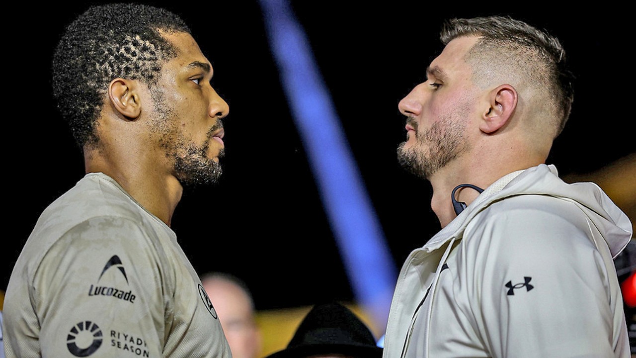 FACE OFF: Anthony Joshua vs. Albania’s Kristian Prenga • HEAD TO HEAD in Jeddah | DAZN Boxing backdrop