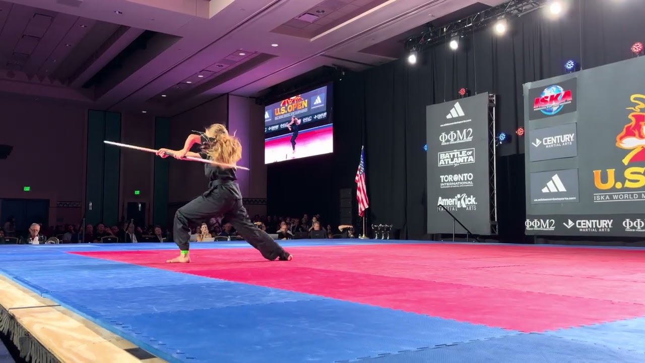 Marianne Ambrose 13 & Under Girls Open Weapons ISKA World Championship backdrop