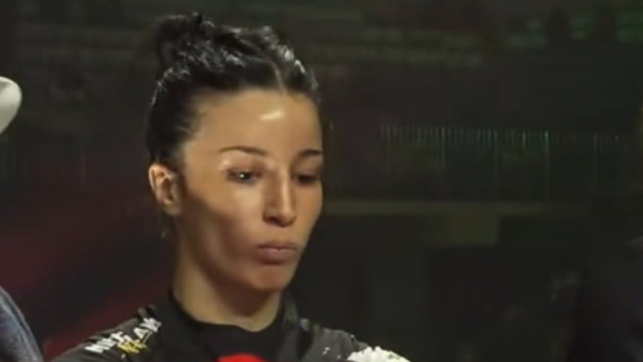 Awesome walk in to the cage to the first MMA fight of Melissa background