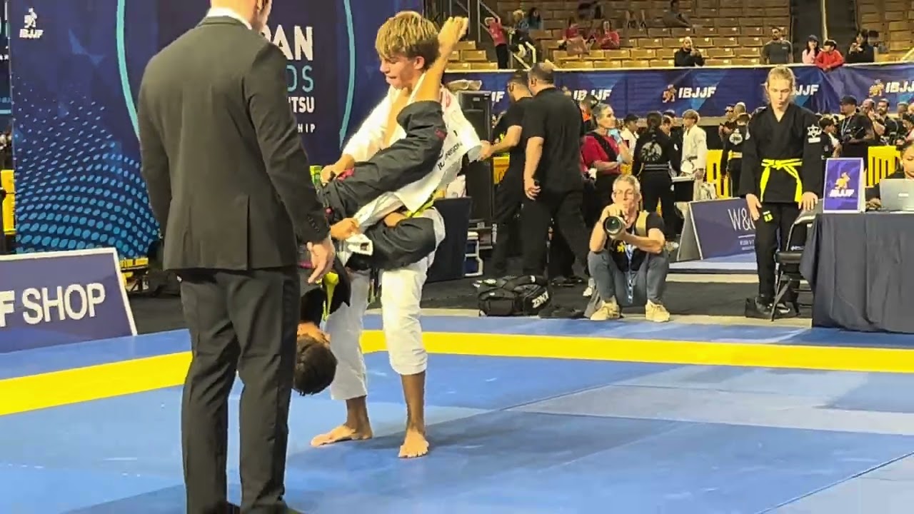 He SHOOK OFF the Armbar... Then Made His Opponent TAP! 🤯 | IBJJF Pan Kids background