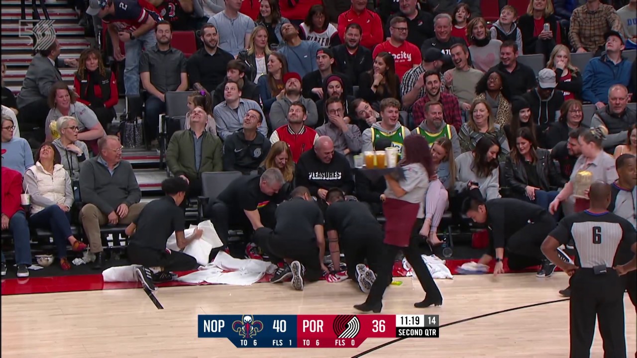 Massive tray of drinks gets spilled when ref bumps into courtside waitress background