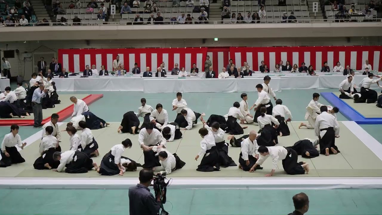 Hombu Dojo (Ueshiba Mitsuteru Dojo-cho) - 63rd All Japan Aikido Demonstration 2026 background