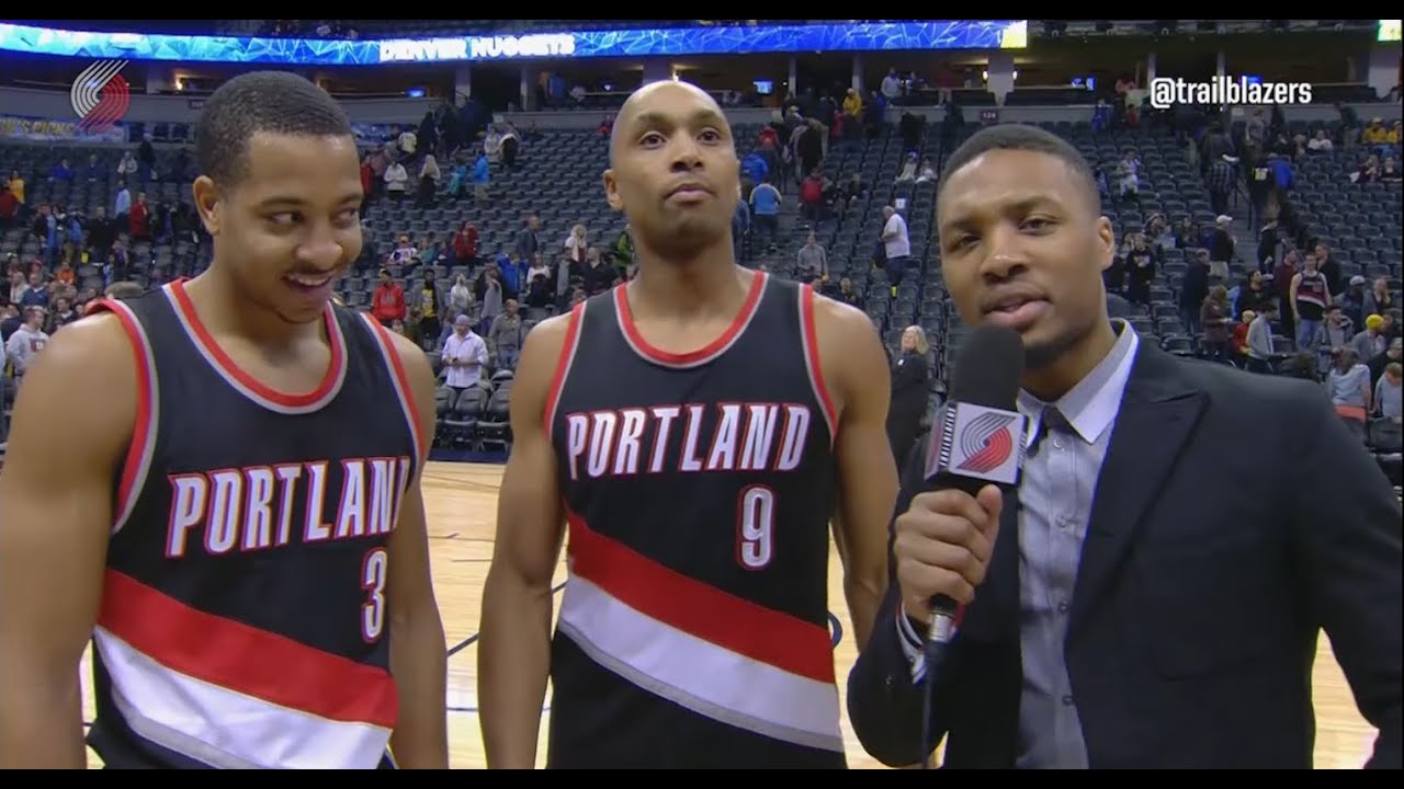 Damian Lillard Handles The Post Game Interview In Denver background