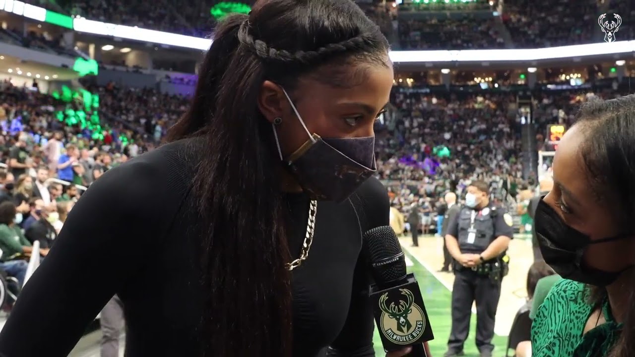 "Giannis Makes All Of Us Fall In Love With Milwaukee." Candace Parker Exclusive Interview background