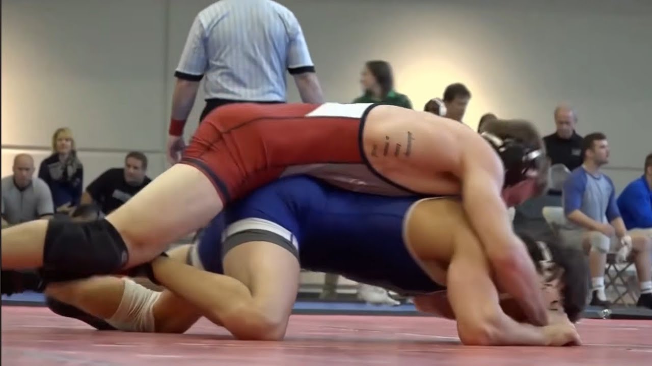 149 lbs Thomas Grippi Johnson & Wales v Zachary Wilhelm Stevens Institute Wrestling background