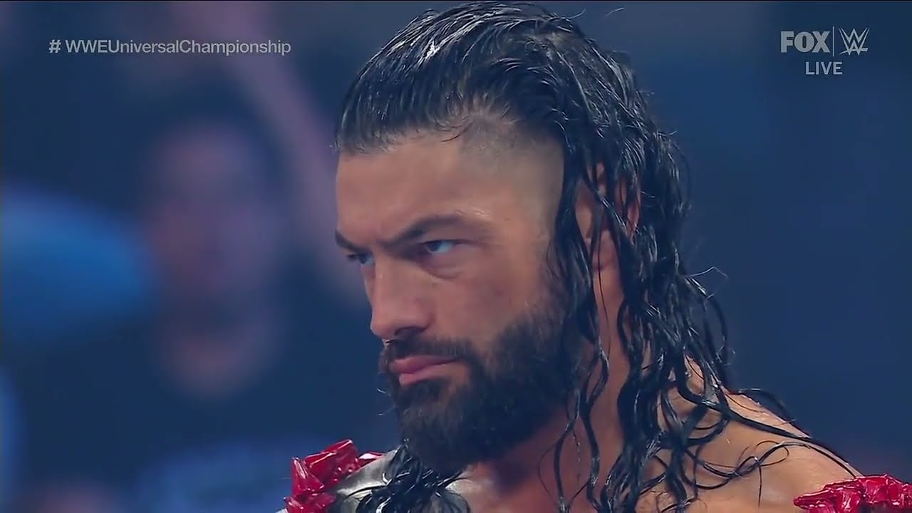Roman Reigns vs Riddle 1/2 background