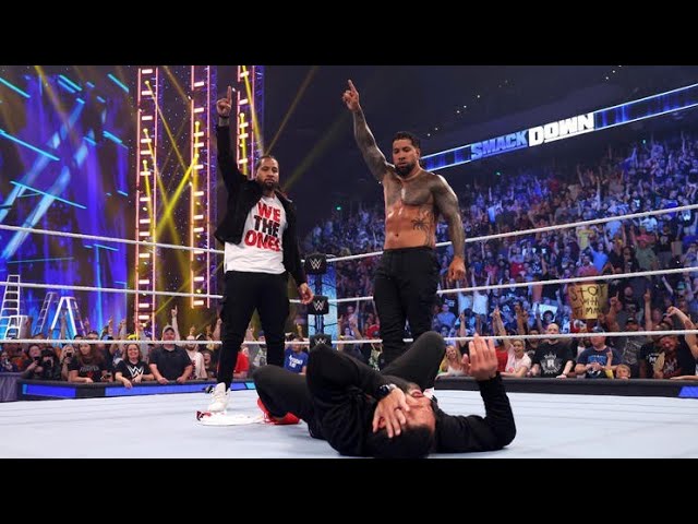 The Usos Superkick Roman Reigns to shatter the cracks in The Bloodline (WWE Smackdown 6/16/23) background