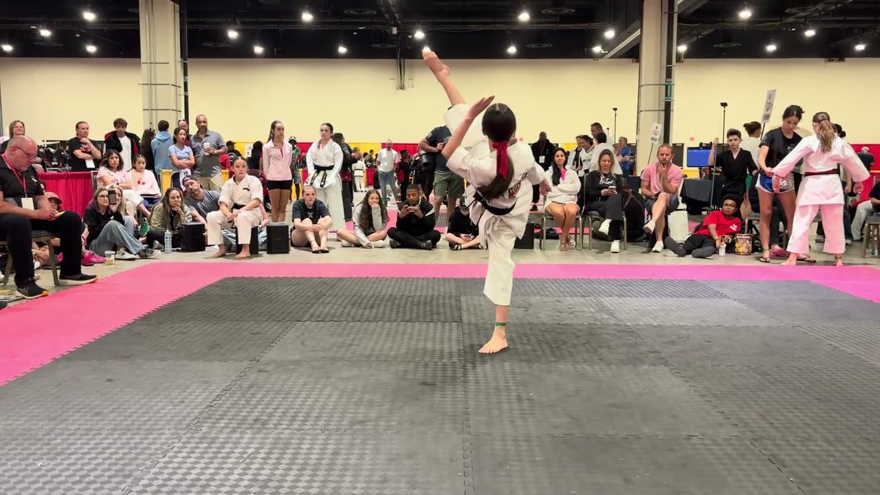 Allison Won 13 & Under Girls Traditional Forms Grand Championship - US Capitol Classics 2026 background