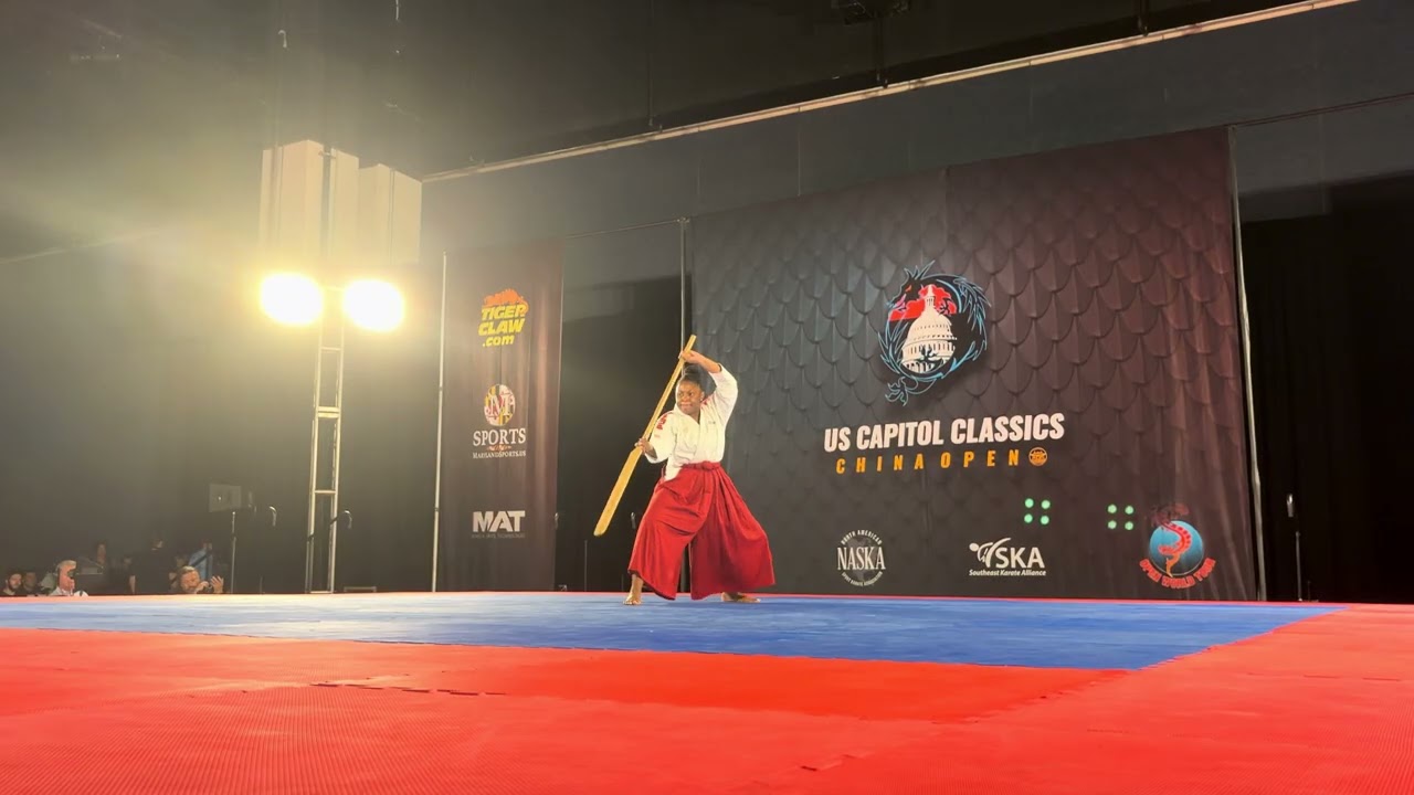 Amber Rutherford Womens Traditional Weapons Grand Championship - US Capitol Classics 2026 background