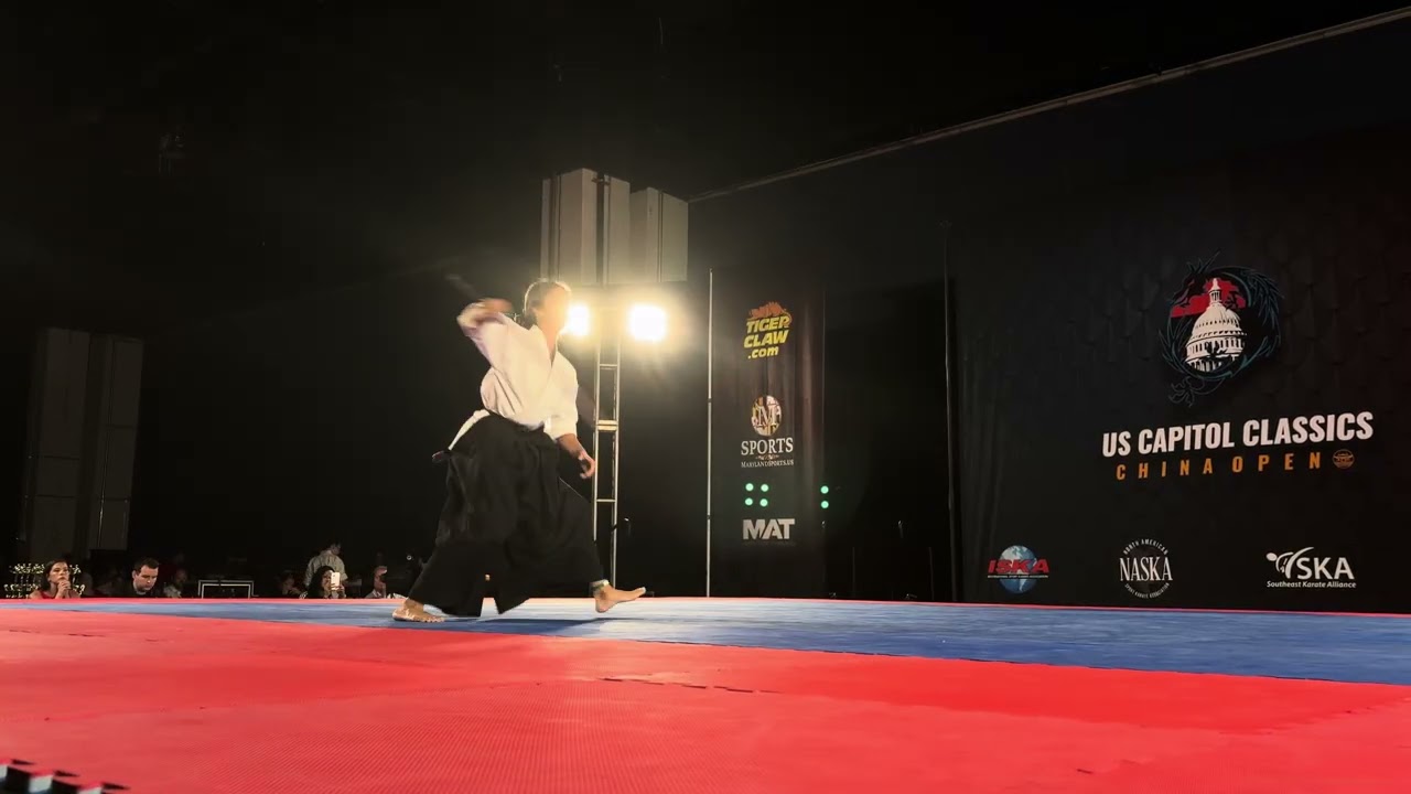 Kaitlyn Vong Womens Traditional Weapons Grand Championship background