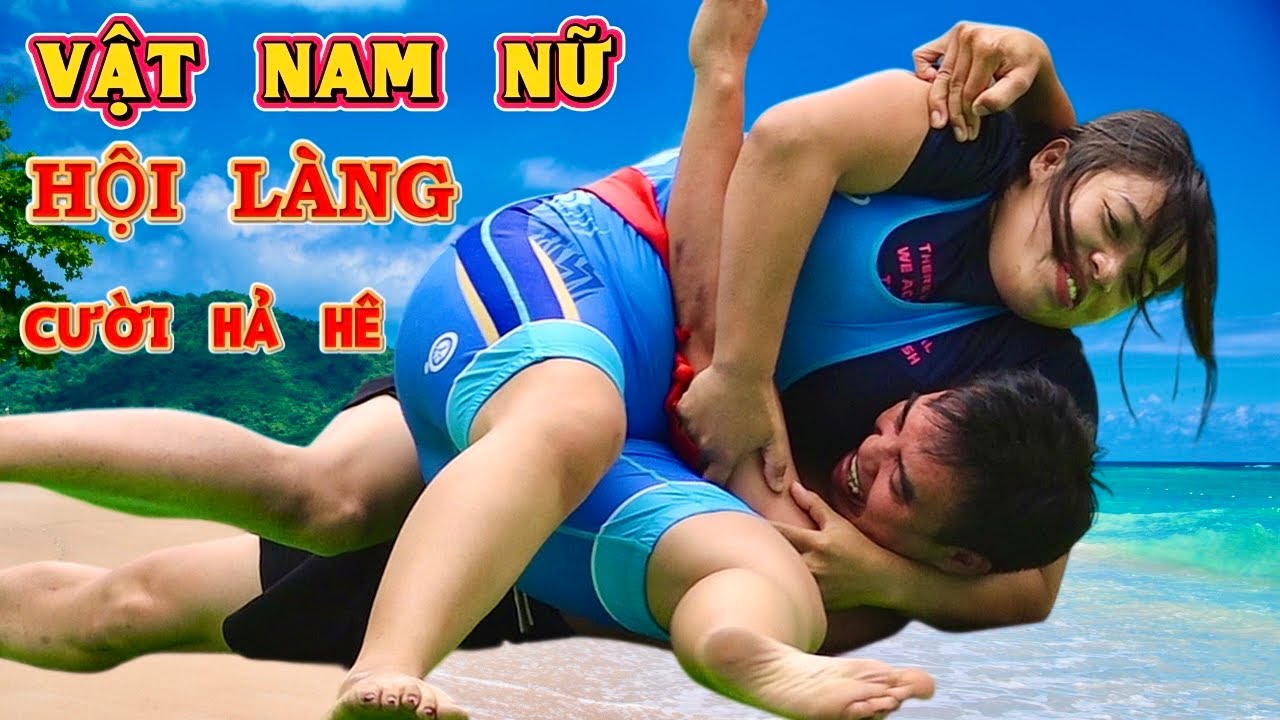 VẬT NAM vs NỮ VUI KHỎE HỘI LÀNG 2026,Women wrestlingwithmenat Traditional village festival . background