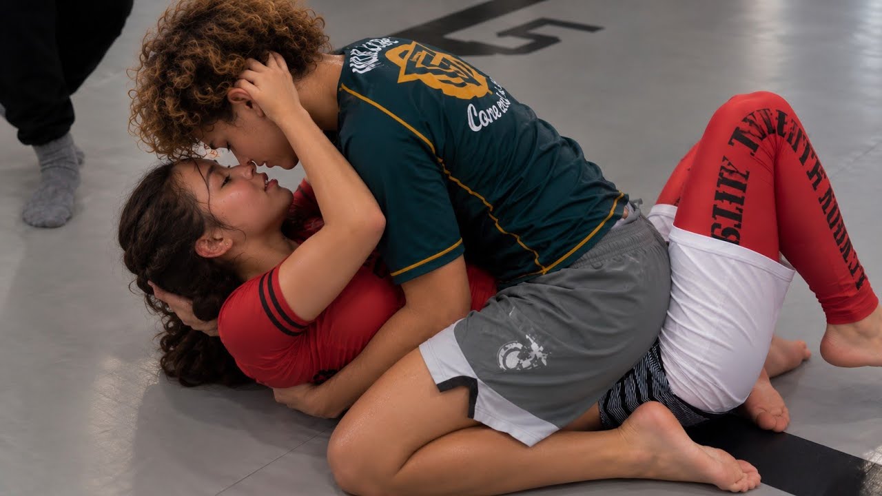🏆 Girl vs Boy Grappling | Who Has the Better Technique? #Grappling #GirlVsBoy #SportsChallenge background